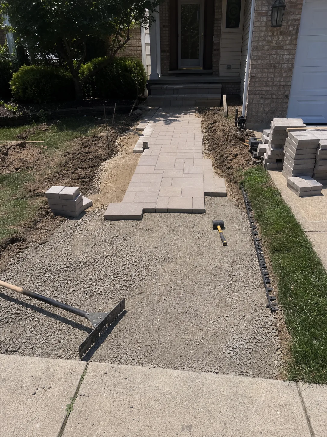 Paver installation Amherst Ohio Lorain County walkway entry residential Lake Erie freeze-thaw Derek